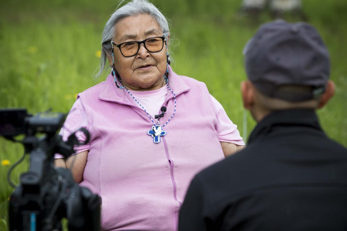 Adam Demientieff interviews Alaska Native elder Mary Deacon in Holy Cross in 2017. Photo by Rachel Saylor