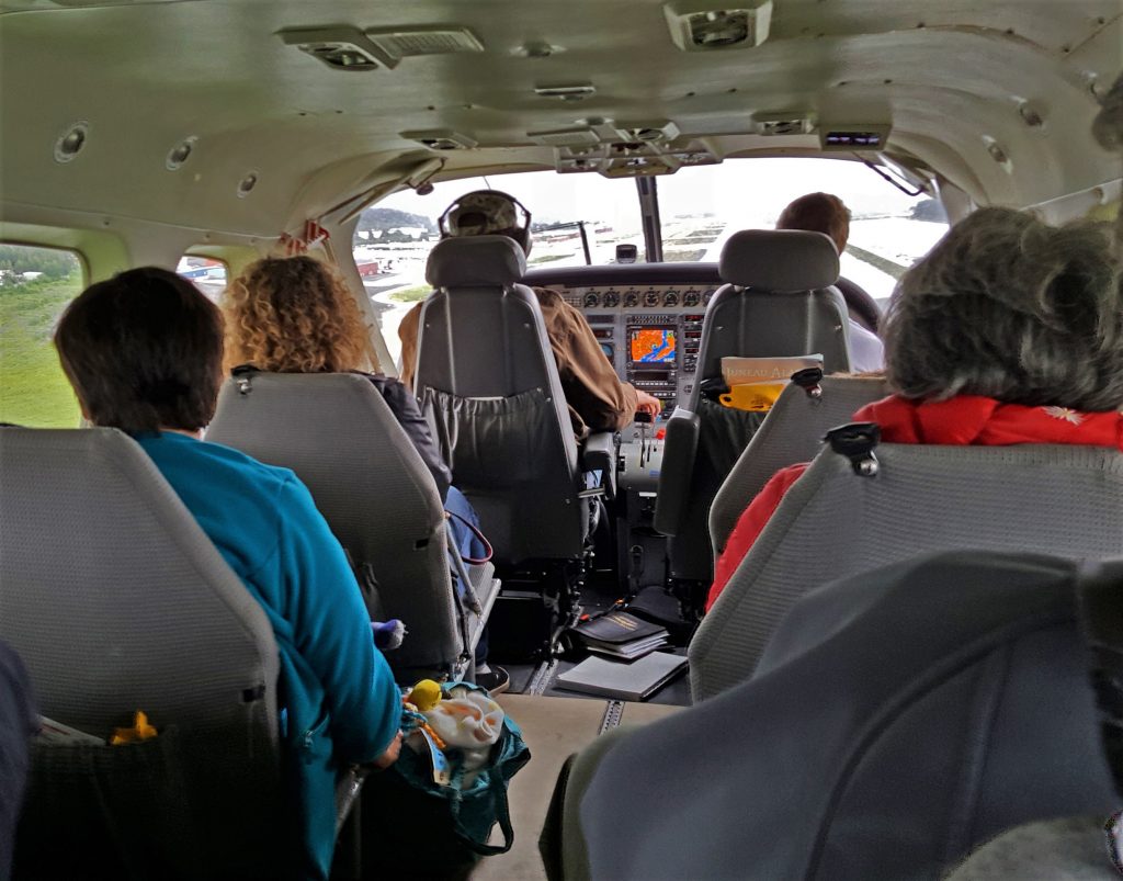 Small interior of an aircraft with only eight seats