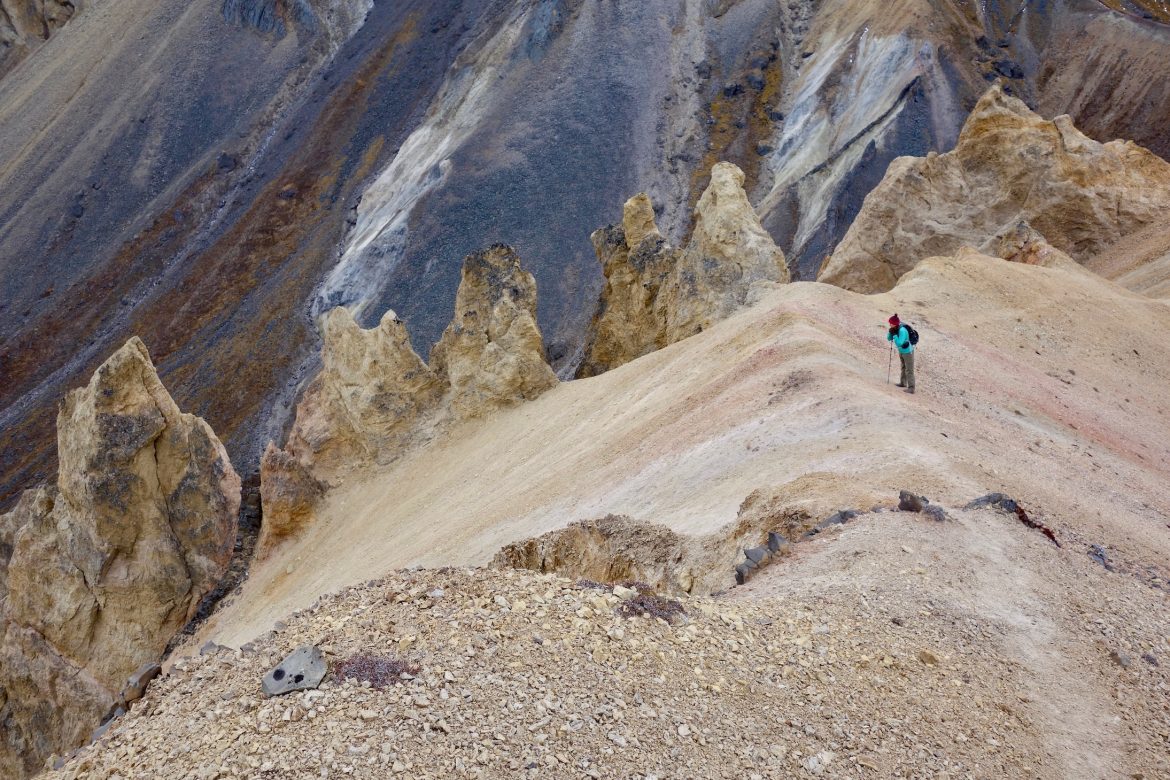 A hiker on a ridge up Theresa Dome