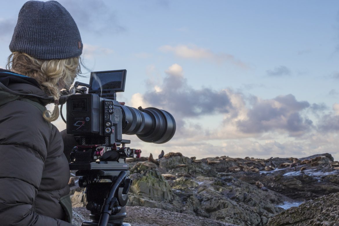 Erin Ranney operating a camera