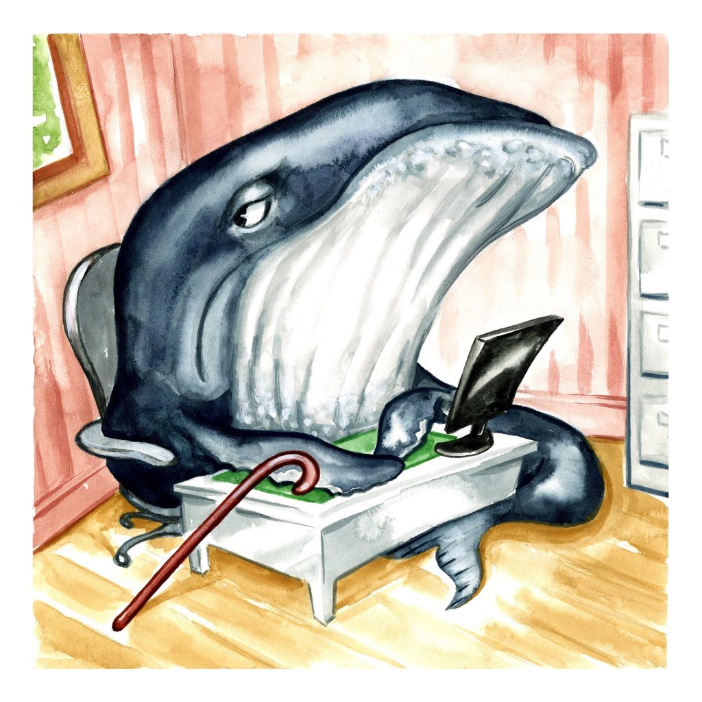 A humpback whale with a cane sitting in front of a computer