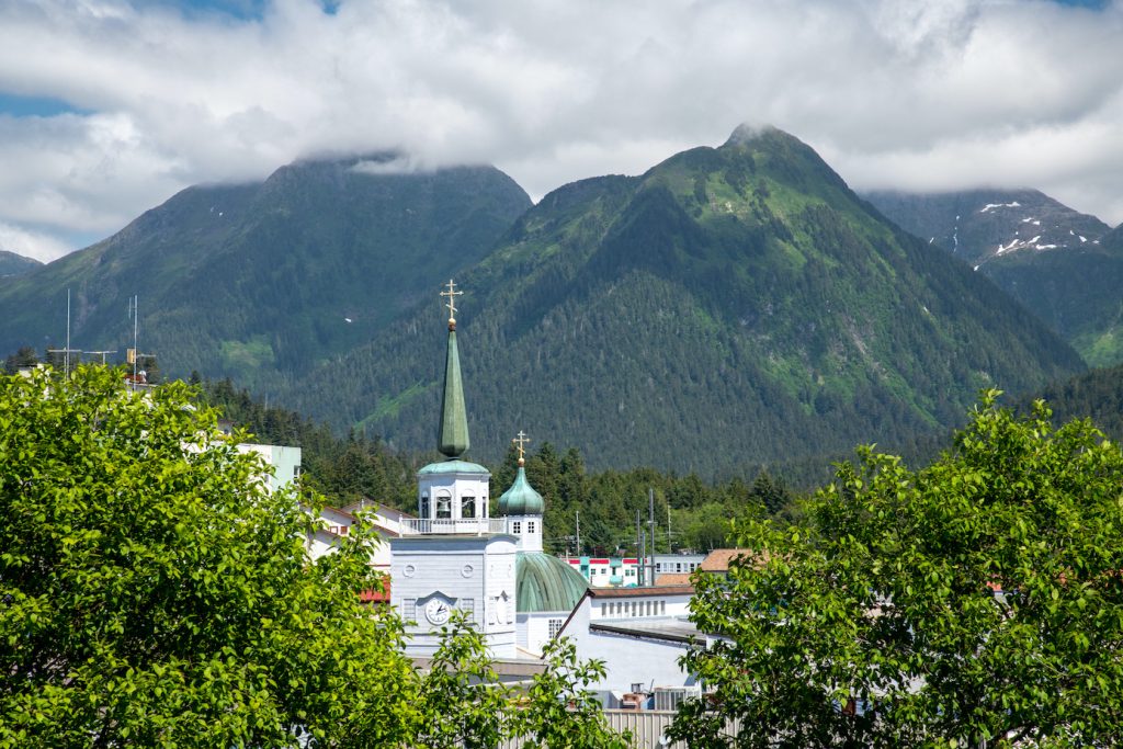 spires of russian orthodox church and mountainous background
