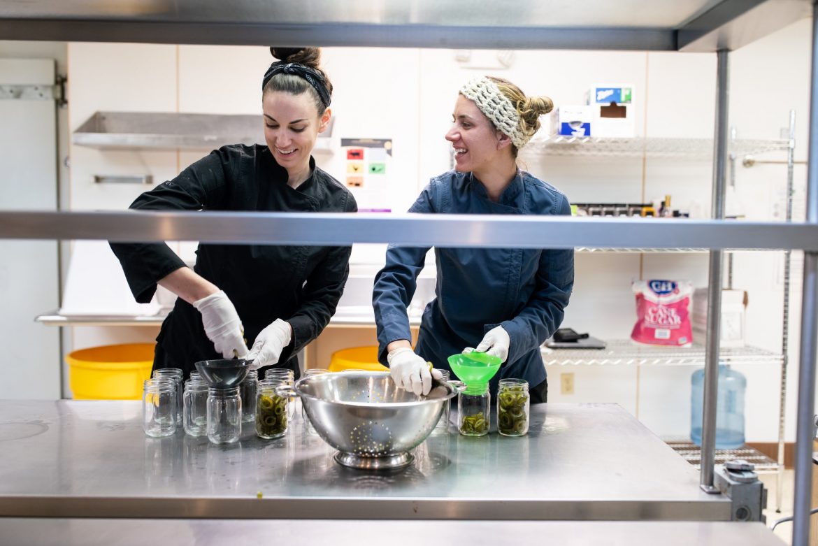 Foraged & Found owner and manager working in the kitchen