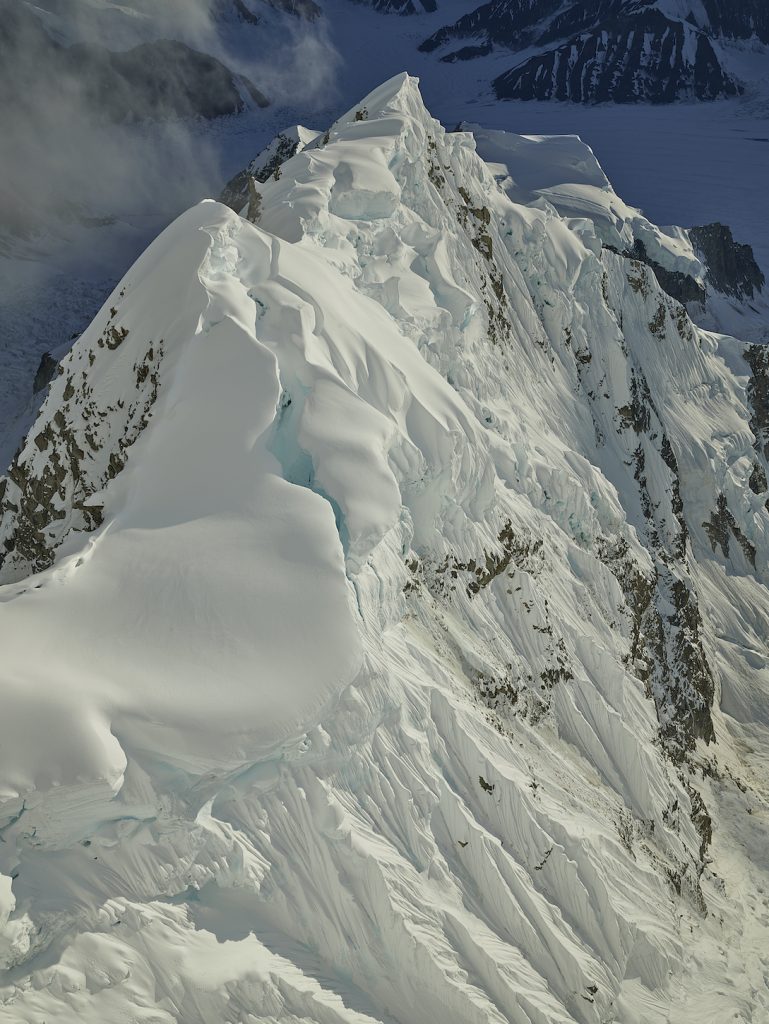 A snow-covered mountain ridge
