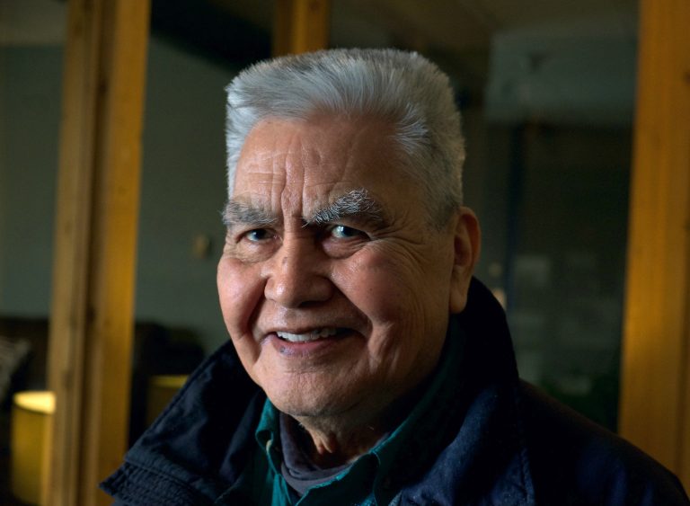 Tlingit man smiling for photo