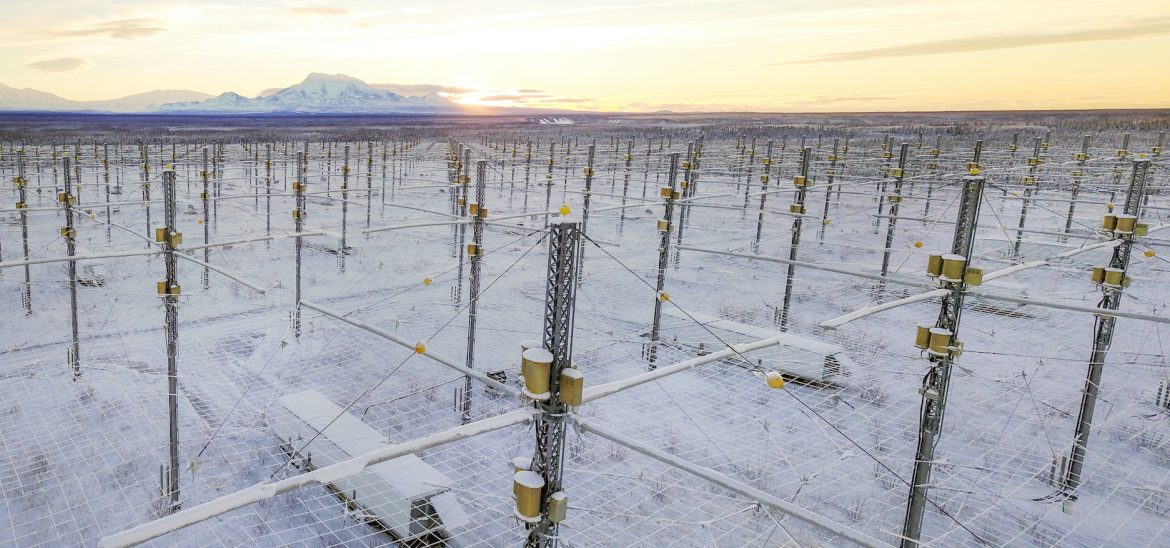 A network of towers and cables spread in a grid across a snowy landscape.