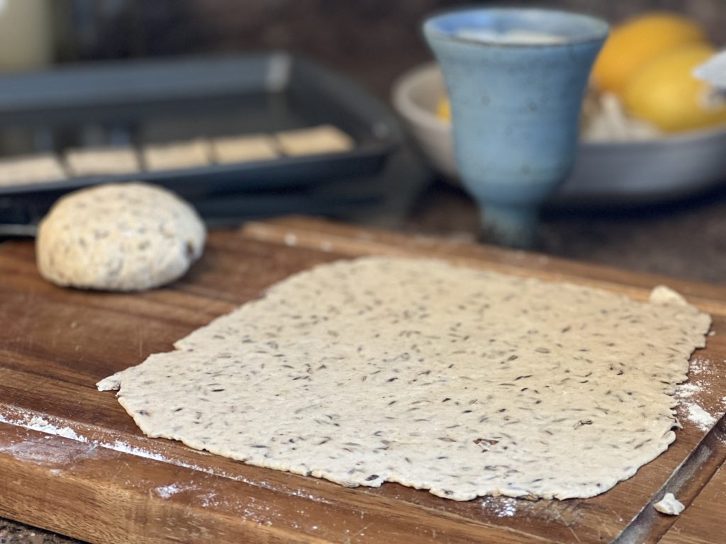 sourdough spread into a flat sheet for baking crackers