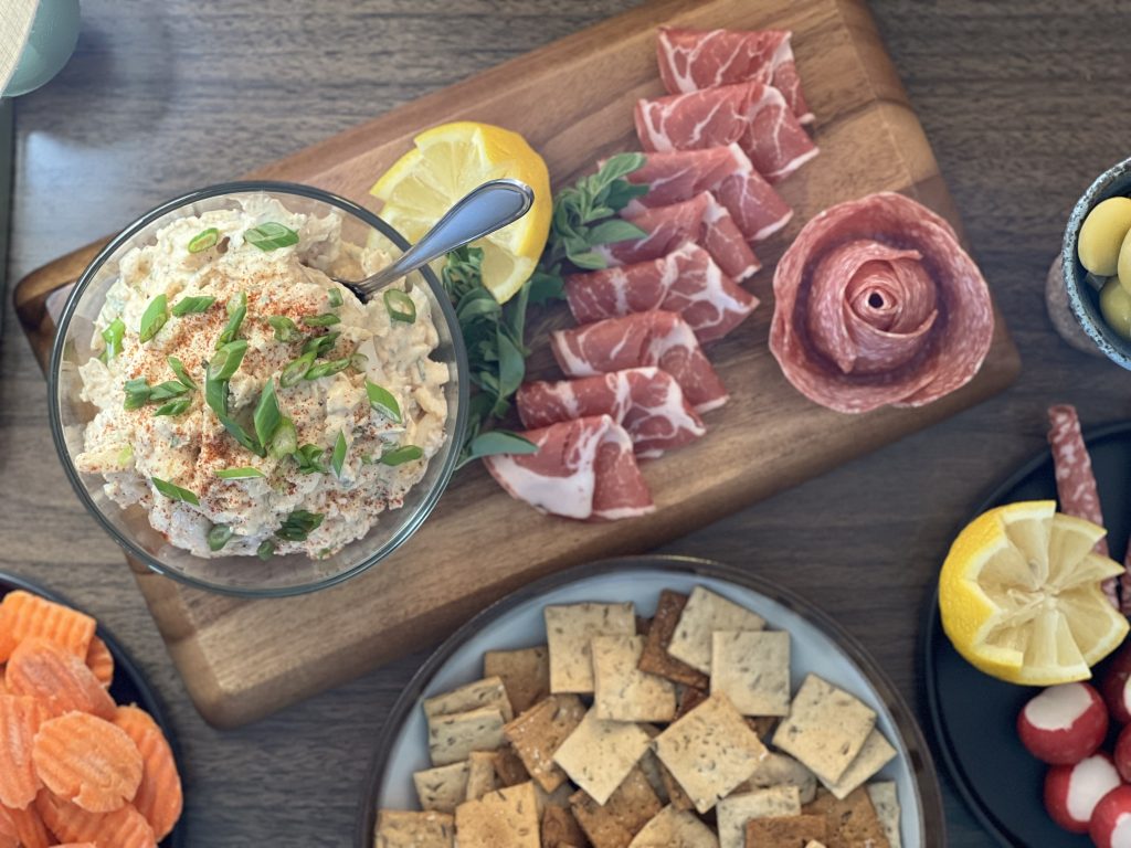 straight above photo of charcuterie board, crackers, and halibut spread