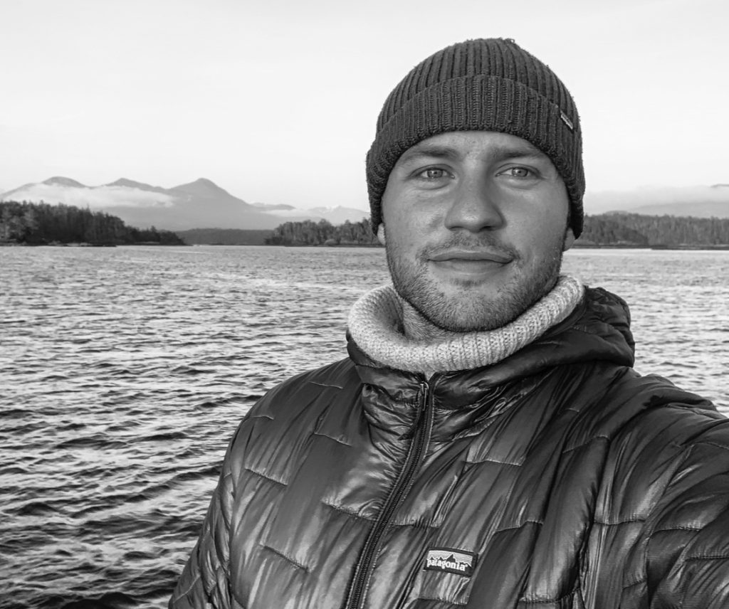 Black and white selfie of wildlife filmmaker Doug Parker