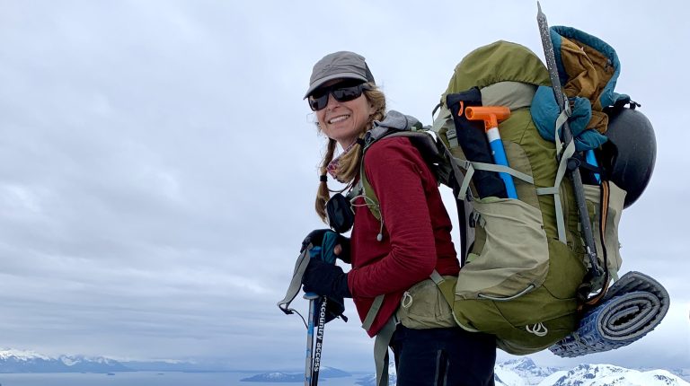 Caroline Van Hemert wearing a loaded pack