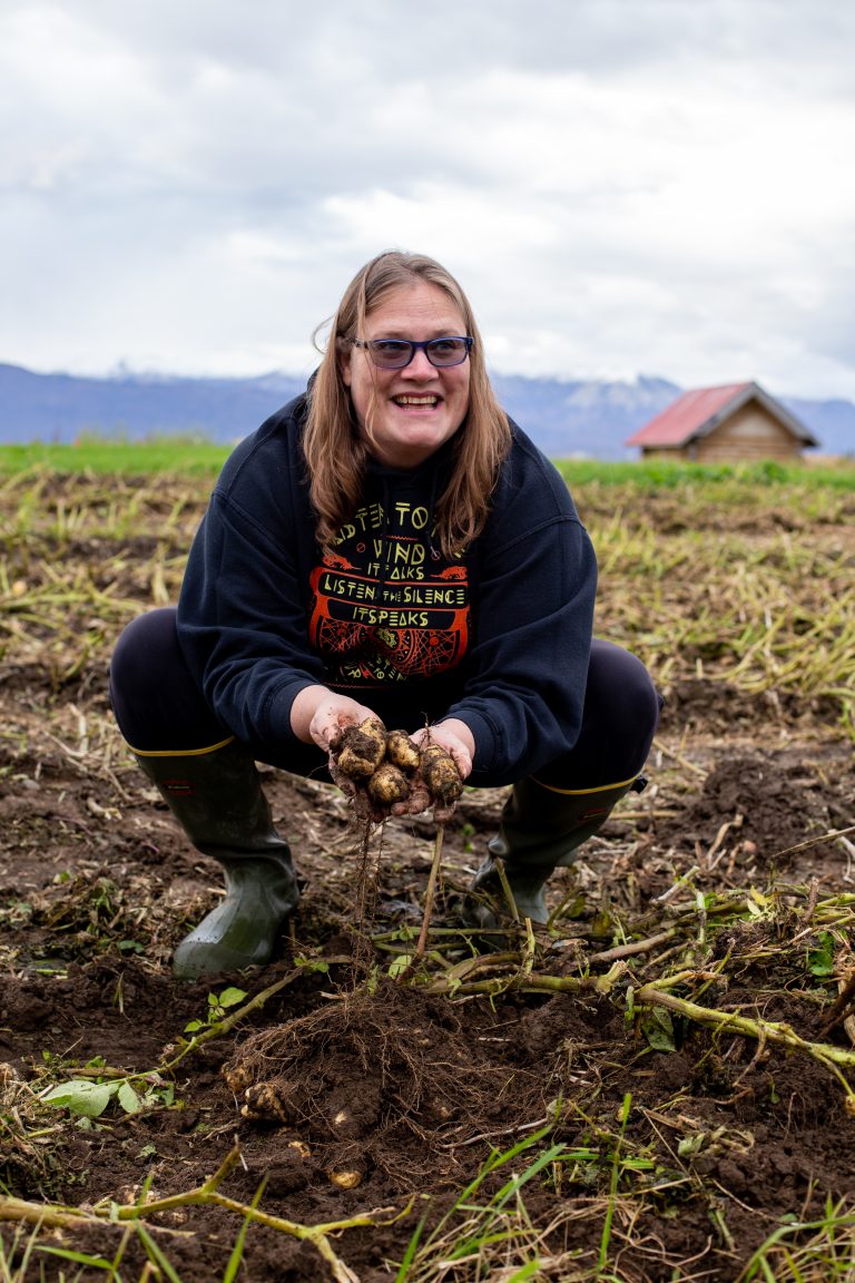 Amy Foote with Alaska-grown potatoes.